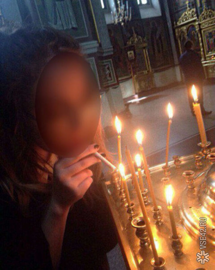 СК начал проверку фото с прикурившей от свечки в монастыре девушки